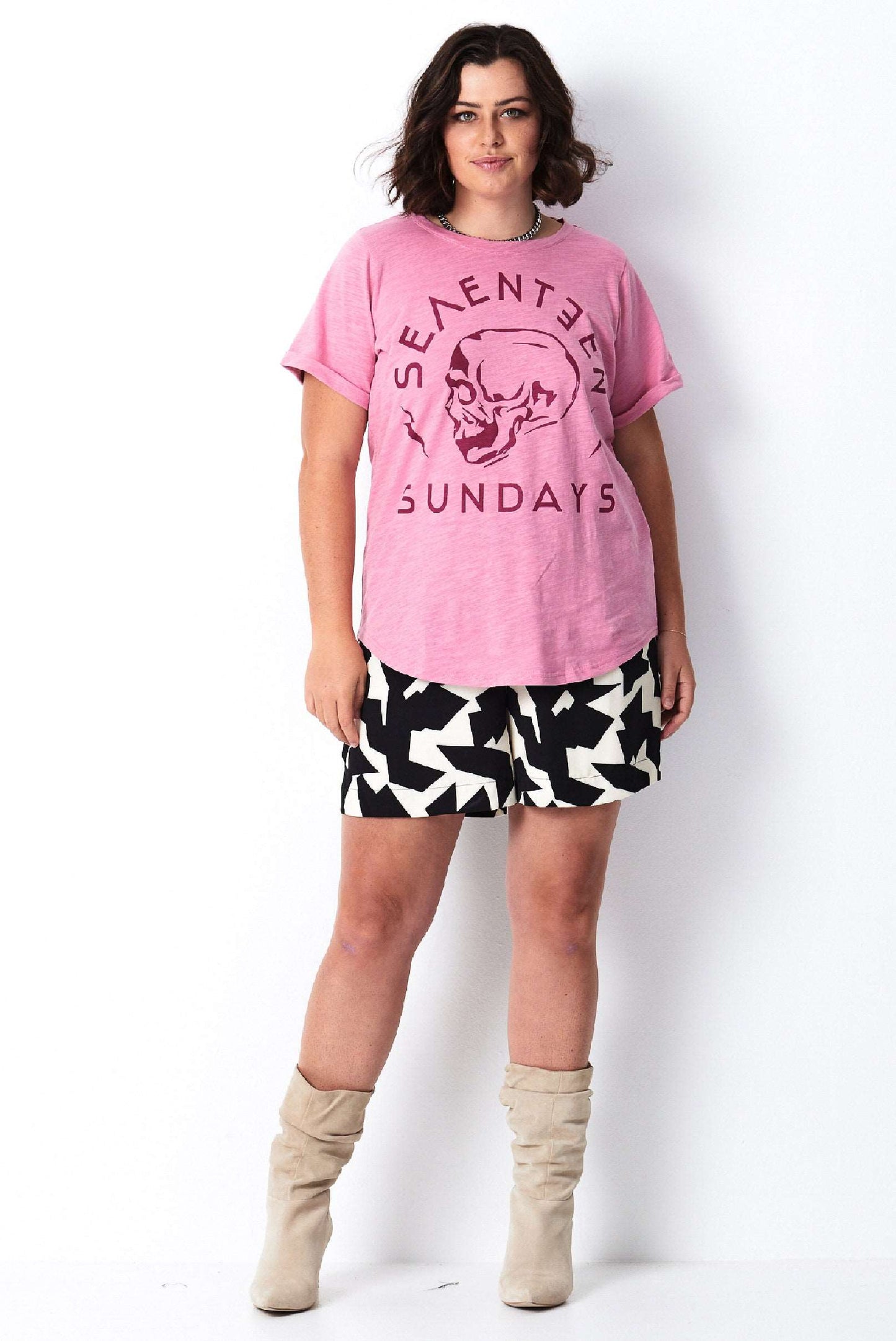 Model wears pink cotton plus size tee with print