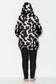 model wears printed plus size raincoat with black and bone print