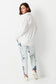 Model wears size 14 white jeans with shibori wash