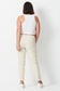 model wears plus size jeans with elastic waist in bone colour