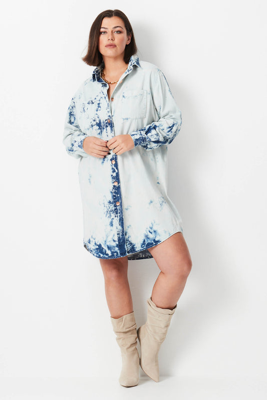 Model wears white and blue shibori dye plus size shirt dress 