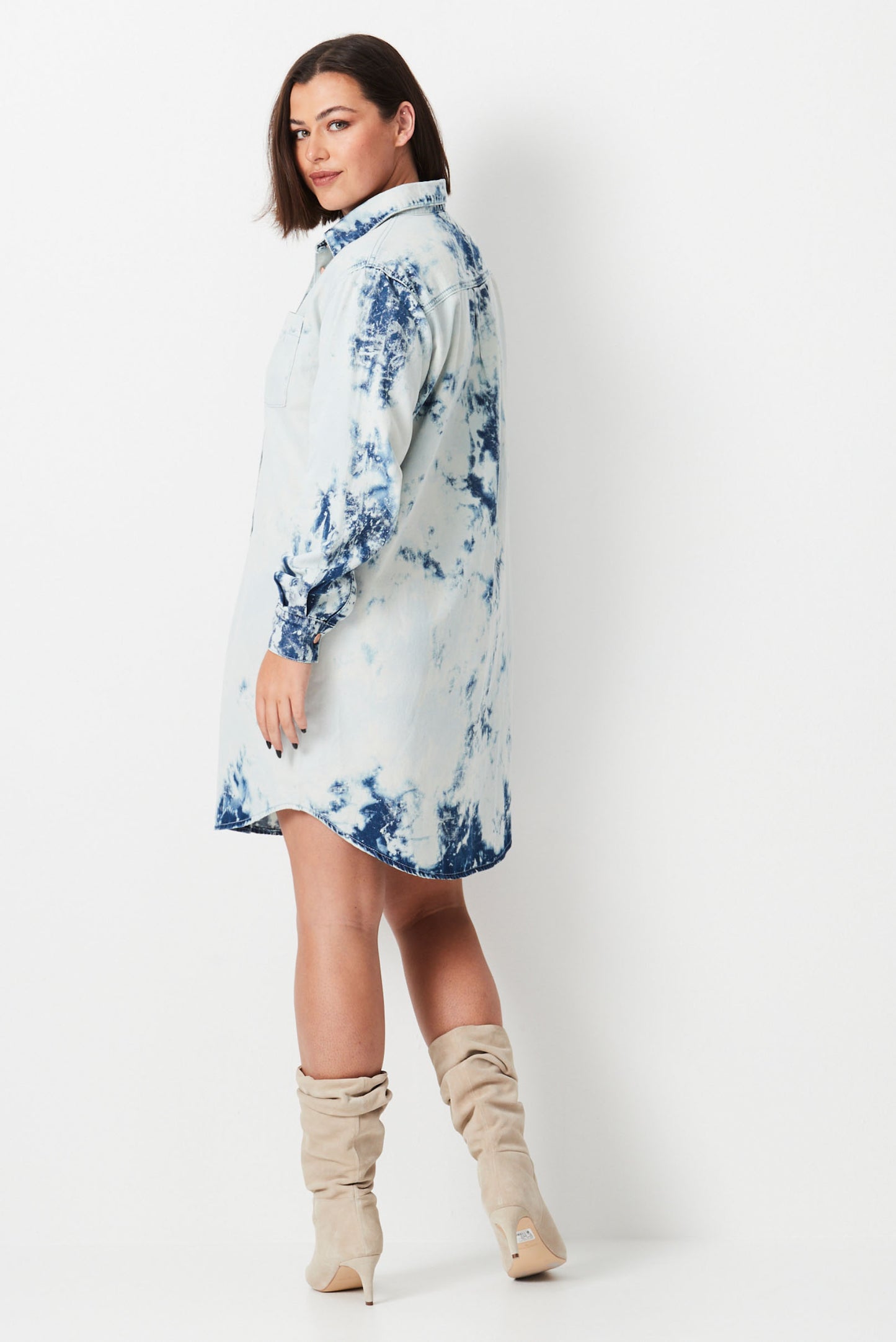 Model wears white and blue shibori tie dye plus size denim shirt dress 